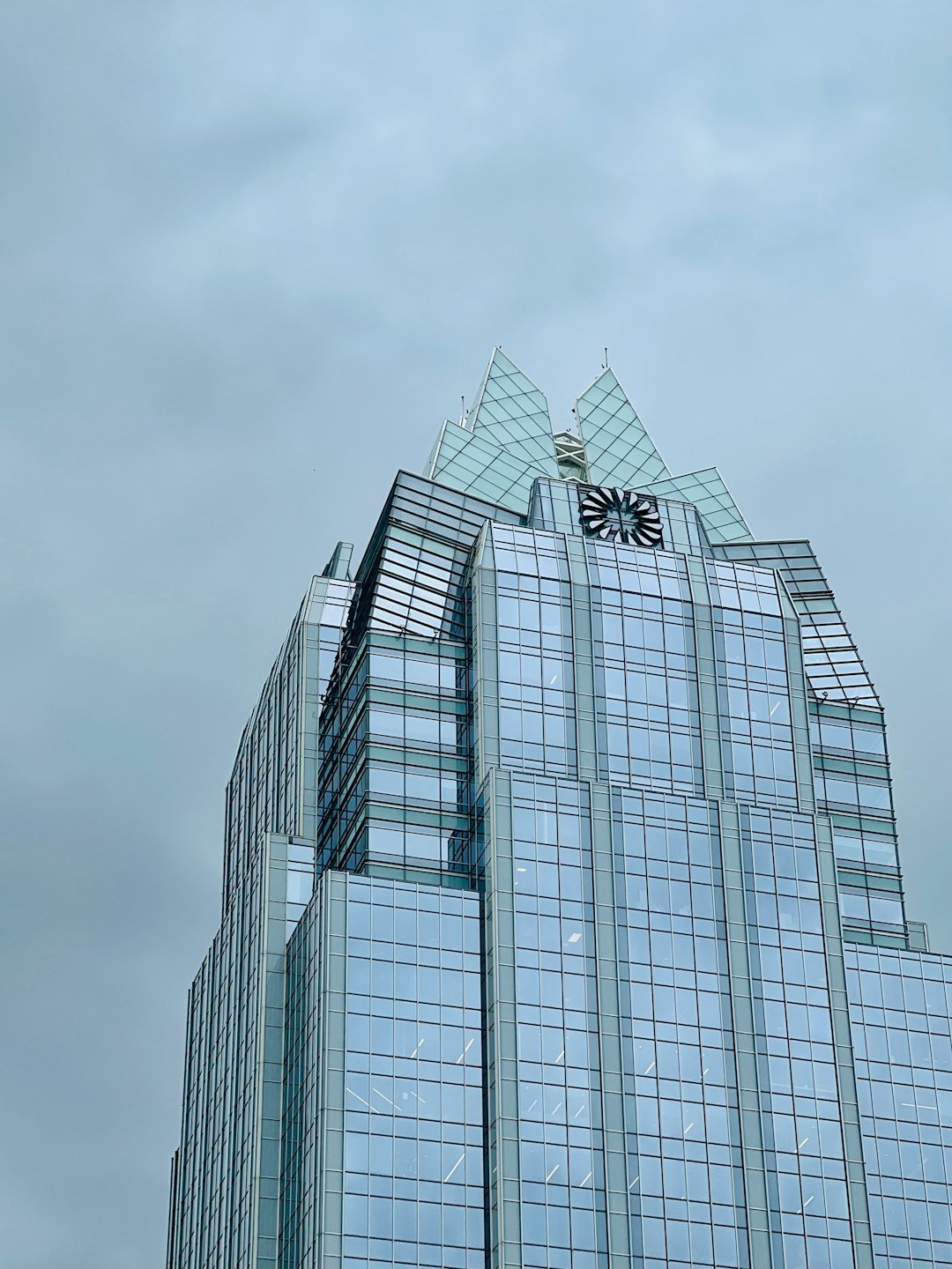 a very tall building with a clock on the top