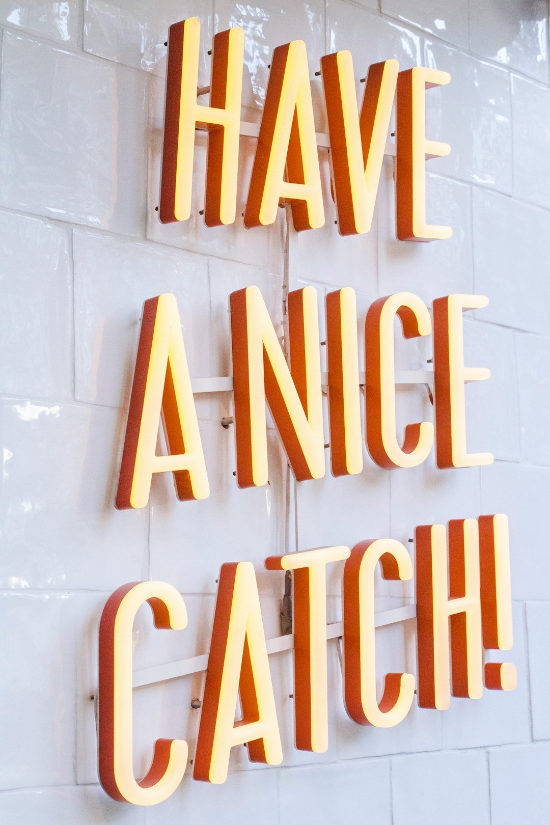 orange Have a Nice Catch! neon signage