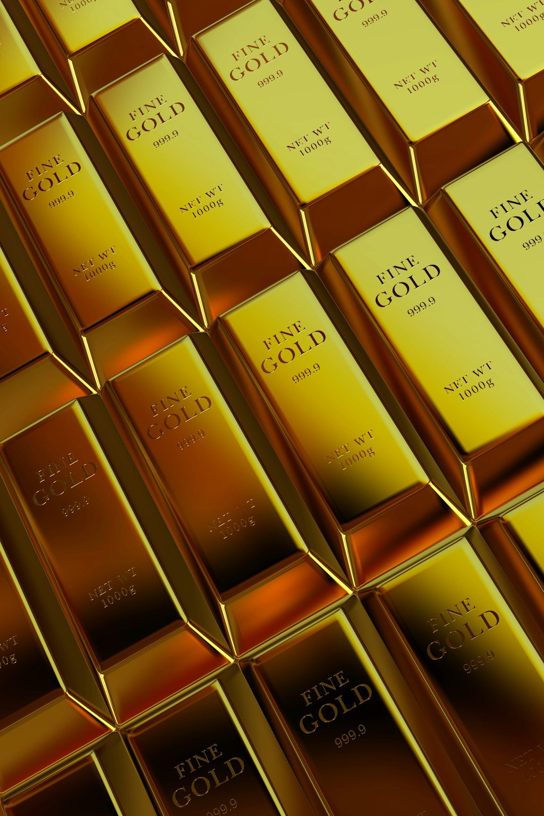 Rows of shiny gold bars stacked neatly