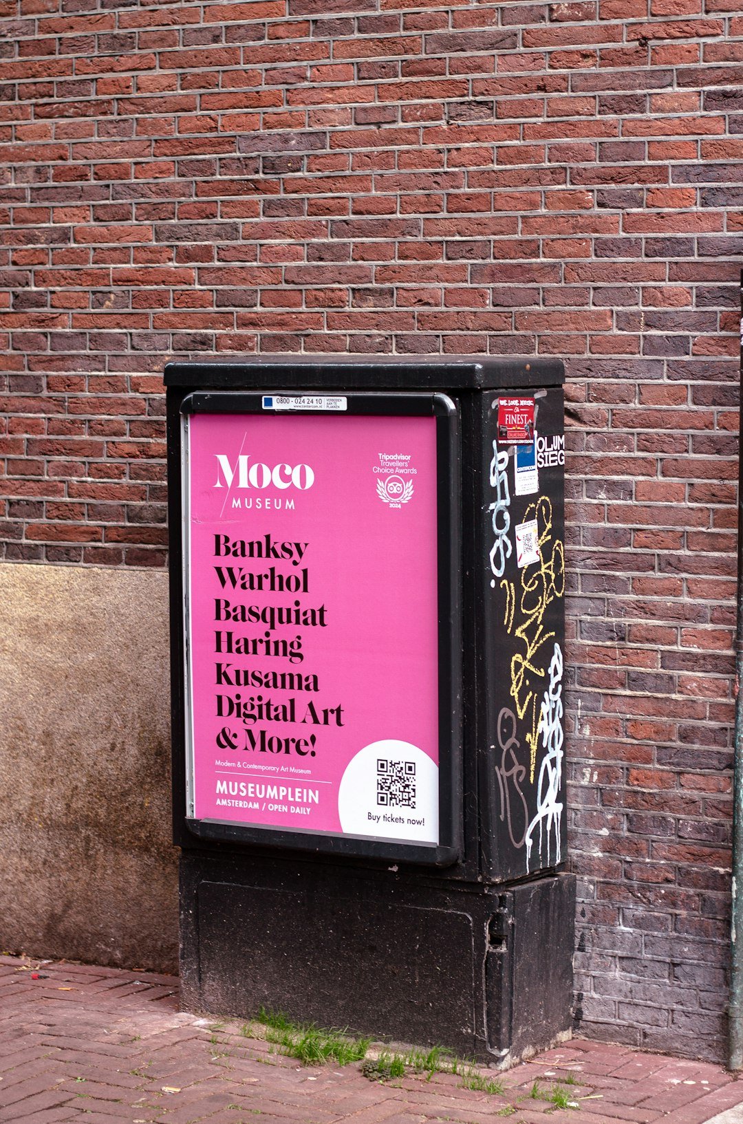 Moco museum advertisement with artist names on pink background.