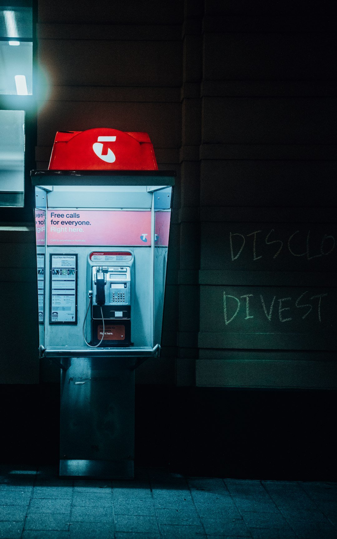 A red hat is sitting on top of a machine