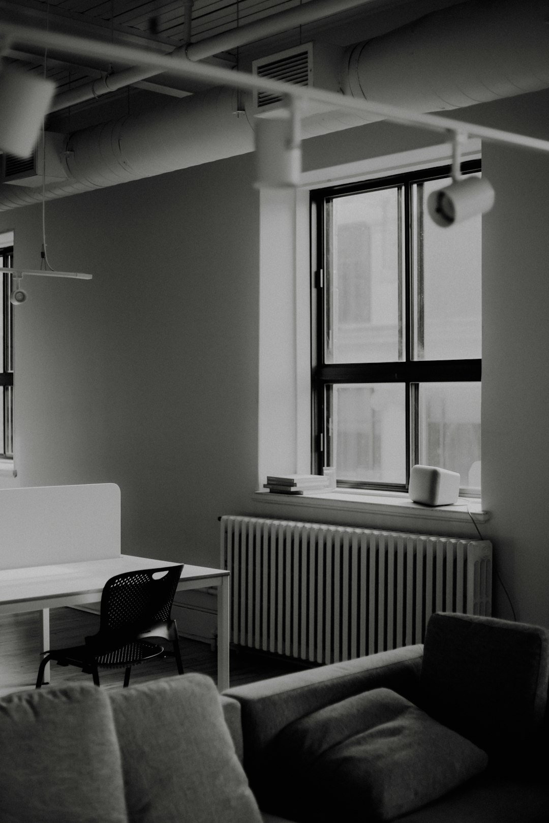 A black and white photo of a living room